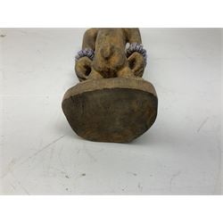 Early 20th century West African Yoruba family wooden figure of Orisha Oko, the god of farming/agriculture, carved from the solid, bears manuscript label of provenance verso H26.5cm