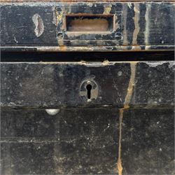 20th century black painted camphorwood lined tool chest, rectangular hinged lid over moulded edge, black painted exterior with iron straps and carry handles, the interior fitted with sliding lidded trays and drawers with turned handles, containing an assortment of hand tools
