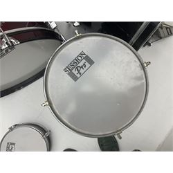 Rockburn eight-piece black drum kit with bass drum, floor tom and five other toms and snare drum; together with two other snare drums; Haosen bass drum; four cymbals; various stands, foot pedals, stool, tri-angle, drum sticks etc