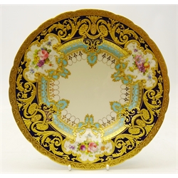  Royal Crown Derby soup bowl from the Judge Elbert Henry Gary service, circa 1909, hand painted by Albert Gregory, signed, with baskets of flowers in cartouche shaped panels on cobalt blue and turquoise ground with raised gilded border incorporating an oval medallion with the initial 'G' by George Darlington, signed, printed back stamp in gilt with Royal Warrant and Tiffany & Co retailer's mark, D24cm. Provenance Property of Bob Heath, Brandesburton Formerly of Ravenfield Hall Farm near Rotherham  