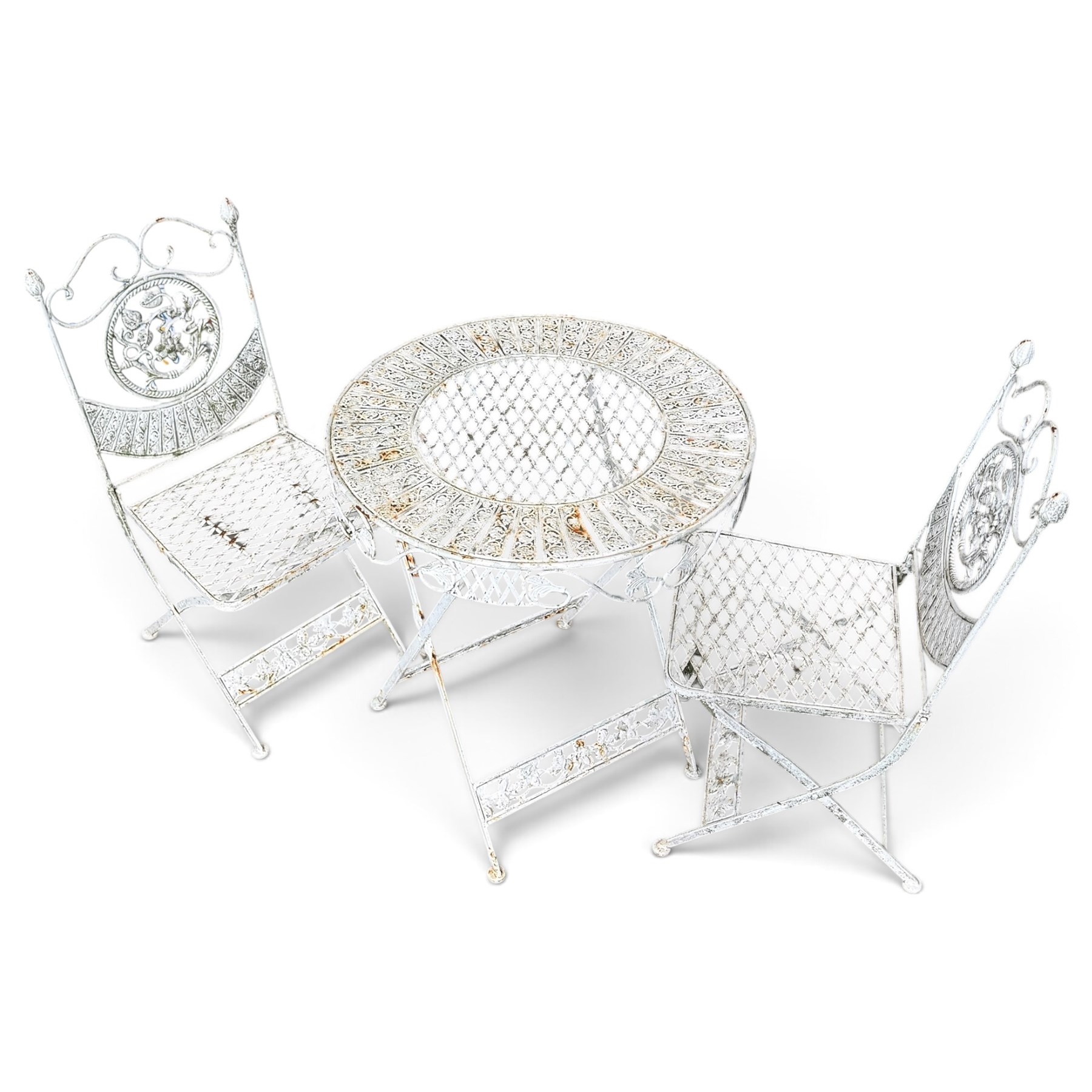 Three-piece French style white-painted wrought iron garden bistro set, comprising a circular folding table with latticework top and apron with scrolling foliate motifs (W70cm H80cm) and matching pair of chairs, with scrolling cresting rail and acorn finials over a scrolled foliate medallion, raised on lattice seat and folding X-frame base (W42cm H93cm)