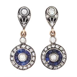 Pair of rose gold and silver diamond and sapphire pendant earrings, each stud set with a r...