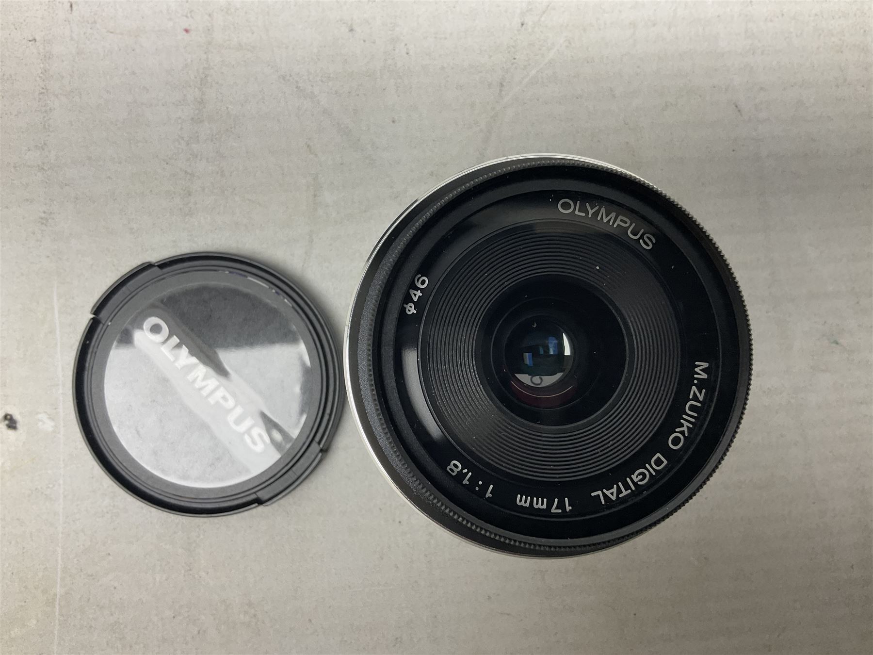 Olympus PEN-F camera body, with 'Olympus M- Zuiko Digital 25mm 1: 1.8' lens,  'Olympus M- Zuiko Digital 75-300mm 1: 4.8 - 6.7' lens and  'Olympus M- Zuiko Digital 17mm 1: 1.8' lens, with original box, together with Lowepro camera bag