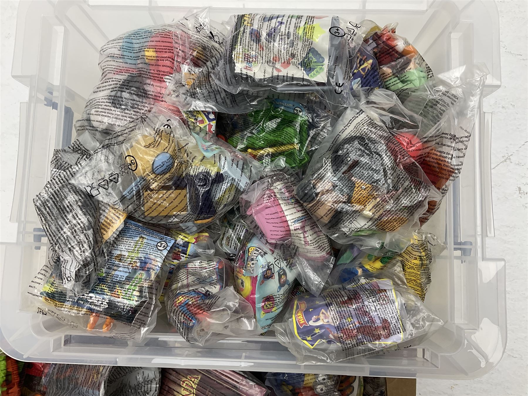 Large quantity of Mcdonalds toys to include Mario in three boxes