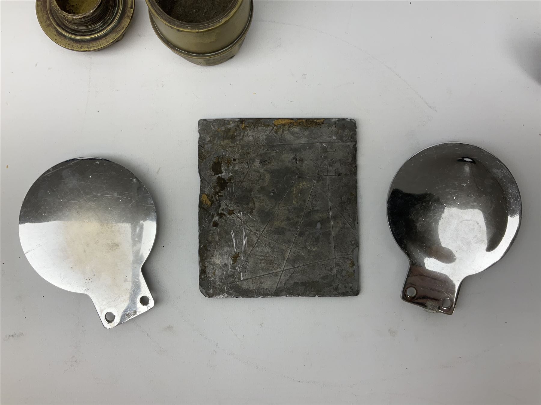 Three brass cart wheel hub caps for W. Johnson & Son Builders Hull, another for W. Harrison Builder Hull, copper printing plate for Hull & Barnsley Railway Timetable, two Hull & District Road Transport Training Group Advanced Driver car badges and framed 1952 car road task disc (8)  