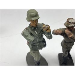 German Lineol Flak Artillery Gun on revolving base H11cm; four other Lineol WW2 German soldiers; and three Elastolin German soldiers including reclining radio operator (8)