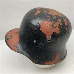 Three battlefield relic helmet shells - WWI German M16; WWI French Adrian; and WWII British (3)