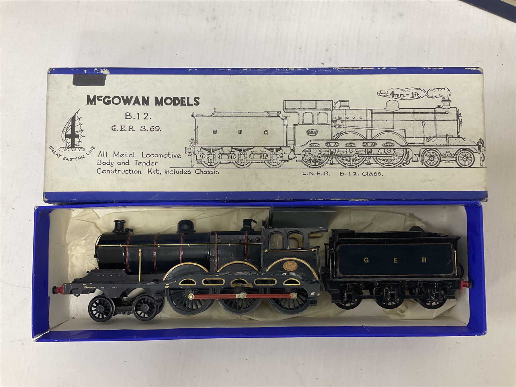 ‘00’ gauge - three kit built steam locomotives comprising GER Class S69/B12 4-6-0 no.1510 finished in GER blue, with McGowan Models box; Aspinall Class 1008 2-4-2T no.50887 finished in BR black, with McGowan Models box; MR/LMS Class 1P 0-4-4T no.1268 finished in LMS black with Craftsman Models box (3) 