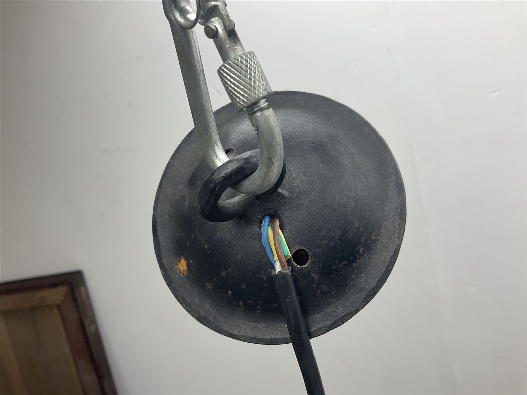 Pair of gothic style wrought iron ceiling lights, each with four branches, D58cm