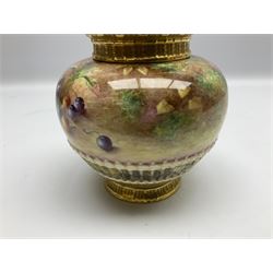 Mid 20th century Royal Worcester potpourri vase and cover decorated by M Johnson, of ovoid form with inner cover and pierced gilt outer cover with bud finial, upon short gilt circular foot, the body part moulded with basket weave bands in gilt and bronze, and hand painted with a still life of fruit upon a mossy ground, signed M Johnson, with black printed mark beneath and painted shape number 1286, H19.5cm