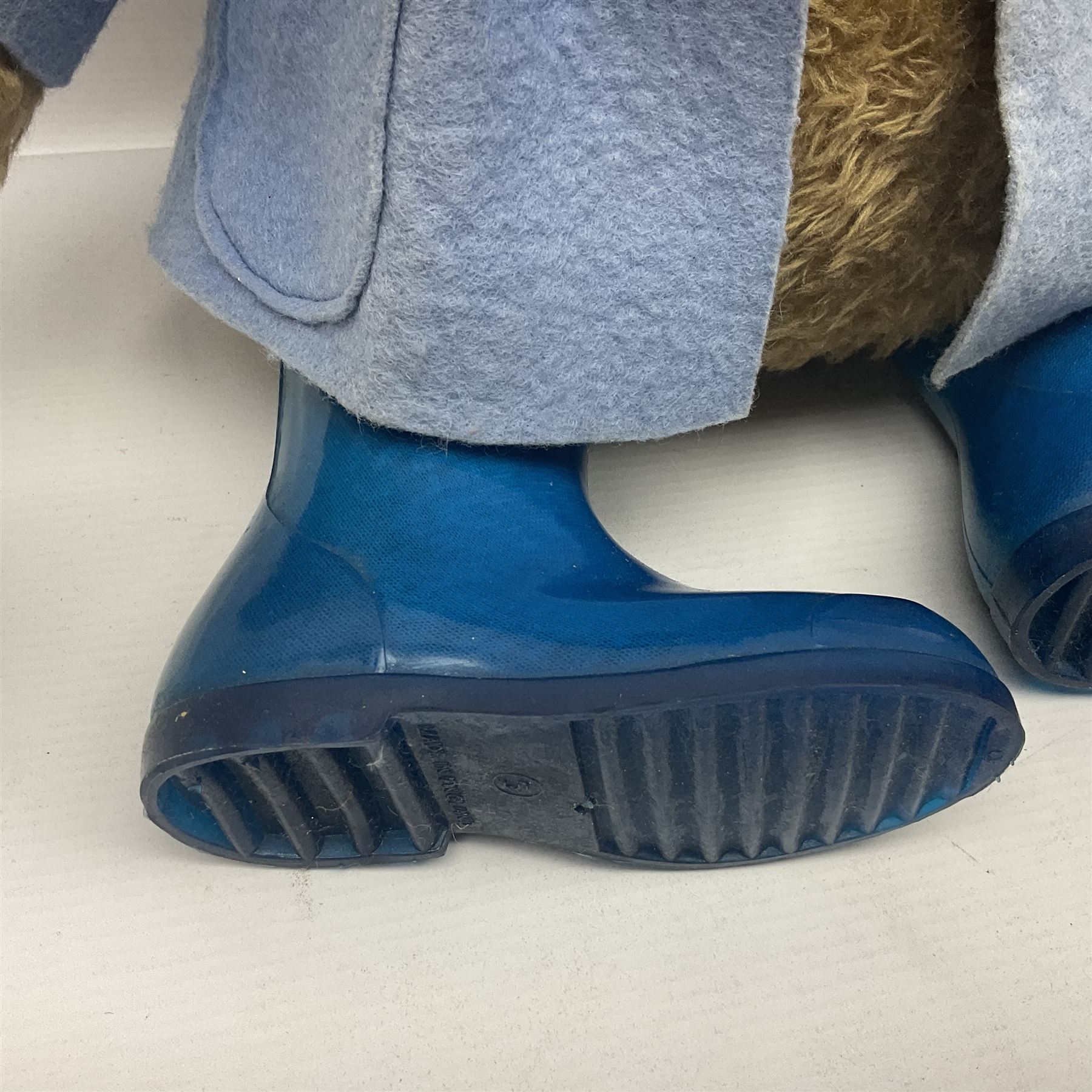 Paddington Bear with plush covered body, brown felt hat, pale blue duffle coat and blue wellingtons H54cm
