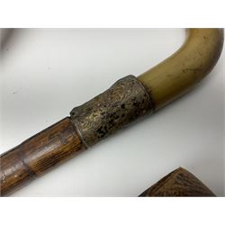 Early 20th century curved horn handle walking stick with hallmarked silver mounts, engraved L Russell 1918, together with a shooting stick by William Mills Birmingham, with leather handle, 'The Featherwaite' shooting stick and an umbrella with wooden handle