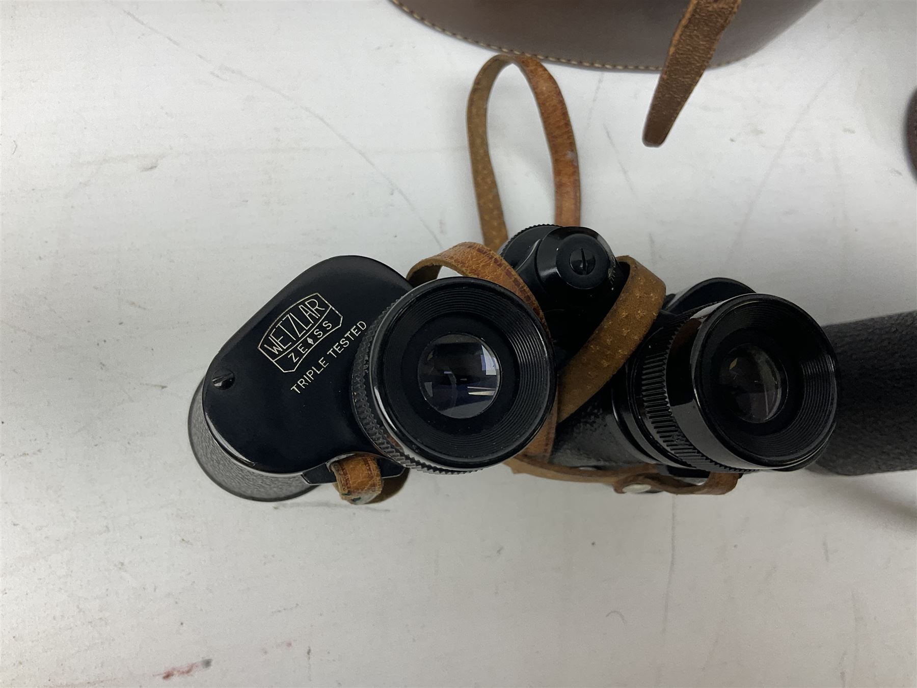 Eleven pairs of binoculars, to include Zeiss Wetzler 20x50, Taylor-Hobson Bino Prism No.2 Mk.III military stamped 1943 with broad arrow,  Swift Tecnar 16x50, J.T Coppock Oceanic Bloomed 10x50, Hensoldt Wetzlar Dialyt 7x42 etc