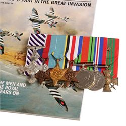 Royal Air Force WWII Distinguished Flying Cross (DFC) medal group with associated documentation, logbooks, ephemera, and personal papers awarded to RAF Flying Officer Leslie Valentine DFC CdeG, pilot of Doulgas Boston E Easy on D Day 1944. The medal group comprises DFC, 1939-1946 Star, The Air Crew Europe Star, France and Germany Star, War Medal, Defence Medal, and Croix de Guerre with siilver star to the ribbon, upon a medal bar. Together with a cased Defence medal, awarded to Valentine by David Cameron at Downing Street November 2012, for his services in the Highland Light Infantry prior to joining the RAF. Together with two logbooks, one including the entry for June 6th ‘Ops “D” Day smoke laying to cover invading troops off Le Havre’, Booklet of provisional pilots notes for Boston IV, associated paperwork for Croix De Guerre, photographs of Flying Officer Leslie Valentine and print by Michael Turner (1934-), Friendly Smoke D-Day 6th June 1944 print, this print is of the R.A.F Douglas Boston that Leslie Valentine was flying on D Day. The print is signed by Leslie Valentine and Flight Lt. John Mackenzie, together with a personal note from the artist.  

In 1939 Leslie Valentine was called up for military service, he joined the Highland Light infantry and spent ten months in France. Upon returning to England, he volunteered to join the RAF. In 1941 he was sent to Medicine Hat in Alberta, Canada, for his training, returning to Britain, for operations training at RAF Bicester, then RAF Finmere, learning to fly Blenheim and Boston bombers. Valentine was posted to squadron no.88 2nd Tactical Air Force, Bomber Command. This squadrons operation were mainly conducted in daylight, in close formation. On D Day 6th June Valentine flew his Boston ‘E-Easy down to 50 feet above the D-Day beaches laying smoke to protect the invasion forces from enemy fire. In total RAF Flying Officer Leslie Valentine DFC CdeG flew sixty back-to-back missions during WWII