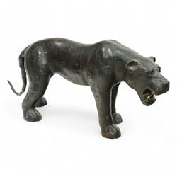 Early 20th century leather-covered decorative model of a Panther in a naturalistic stance,...