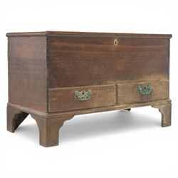 19th century oak mule chest, with lidded top above two short drawers, raised on bracket feet