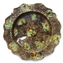 Pair of 18th century cream ware Whieldon type plates decorated with a mottled tortoiseshell glaze D20cm and two other similar plates of shaped circular design