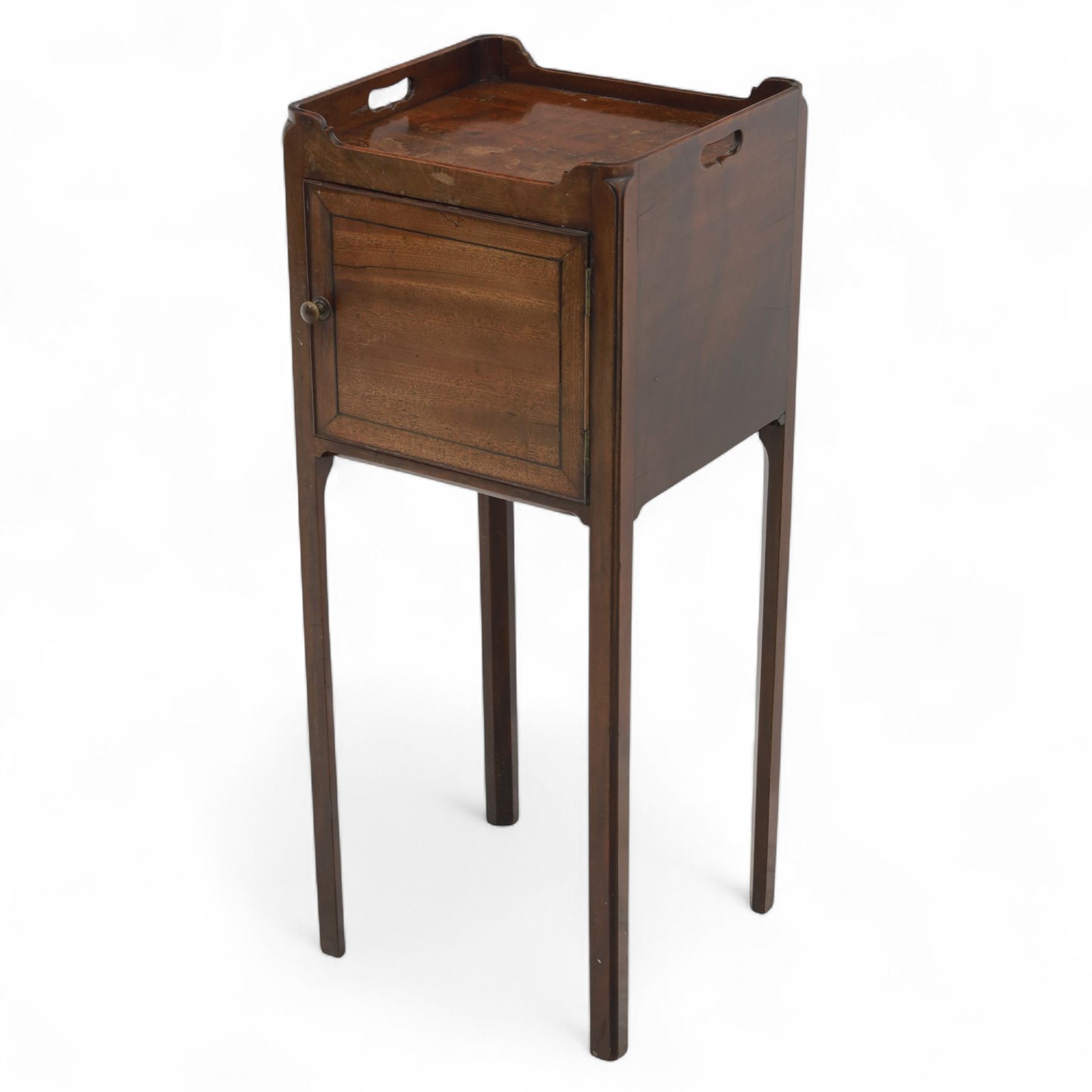 Georgian mahogany bedside cabinet of slender proportions, rectangular galleried top above a panelled cupboard door on square tapered legs 