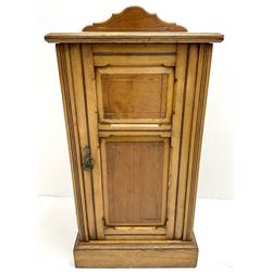 Edwardian ash bedside cabinet, raised shaped back, single cupboard, platform base 