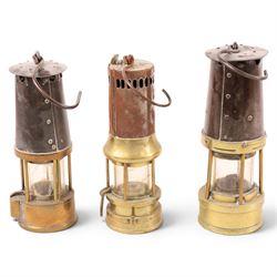 Three mining lamps, including John Davis & Son no. 2 B safety lamp, Protector Lamp & Lighting Co Type SL no. 29 lamp and one other