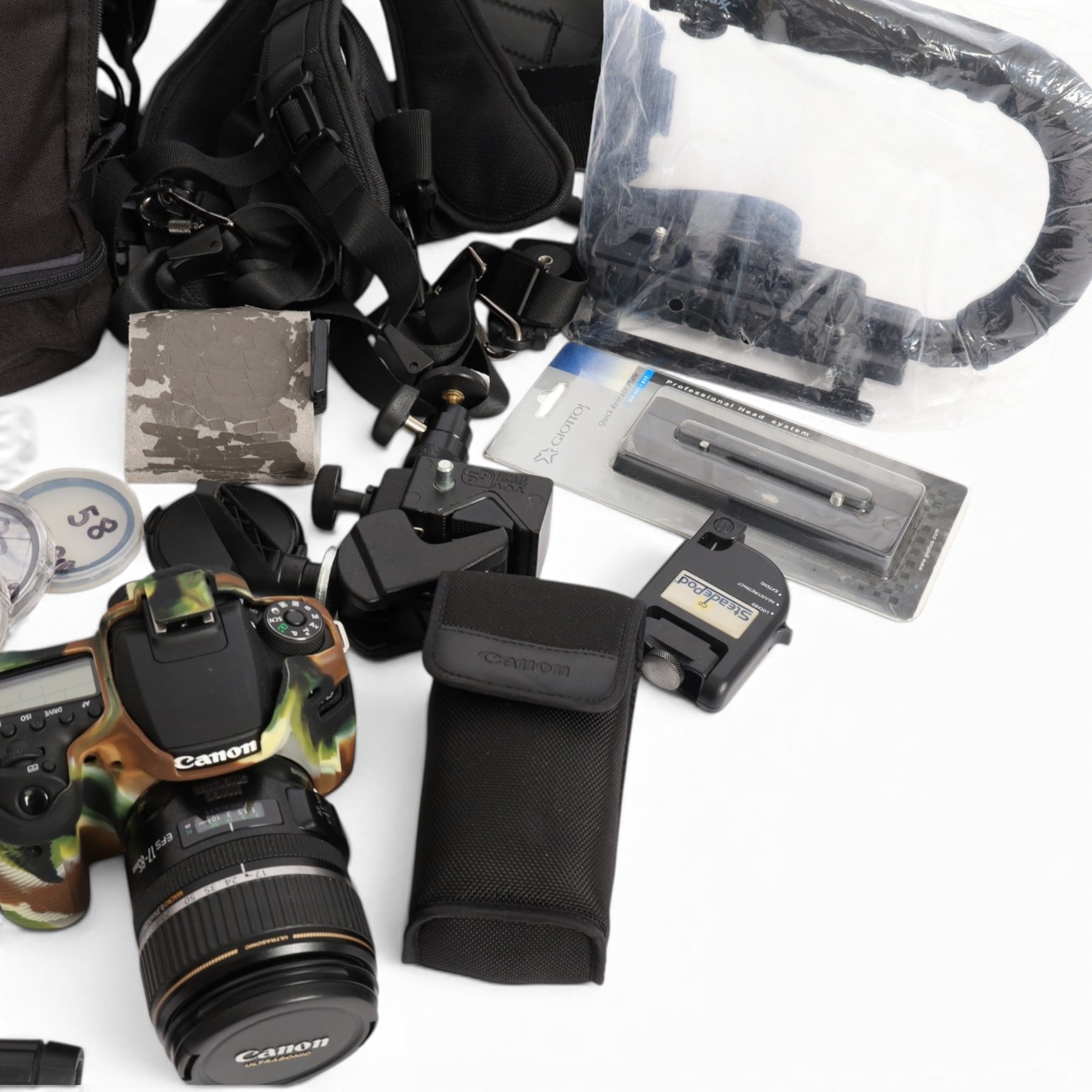 Canon EOS 90D DSLR camera body serial no. 064051002694, in a silicon camouflage case, with a Canon EF-S 17-85mm 1:4-5.6 Image Stabilising Ultrasonic zoom lens serial no. 4512926109, Canon Extender EF 1.4 x III and other accessories including Lowepro carry case, Visionary clamp, Canon Speedlite 430 EXII, Ultimaxx Grip Stabiliser, Newell Dual Battery Charger, Very100 sight, Olympus OM-D EE-1 dot sight, various filters, etc