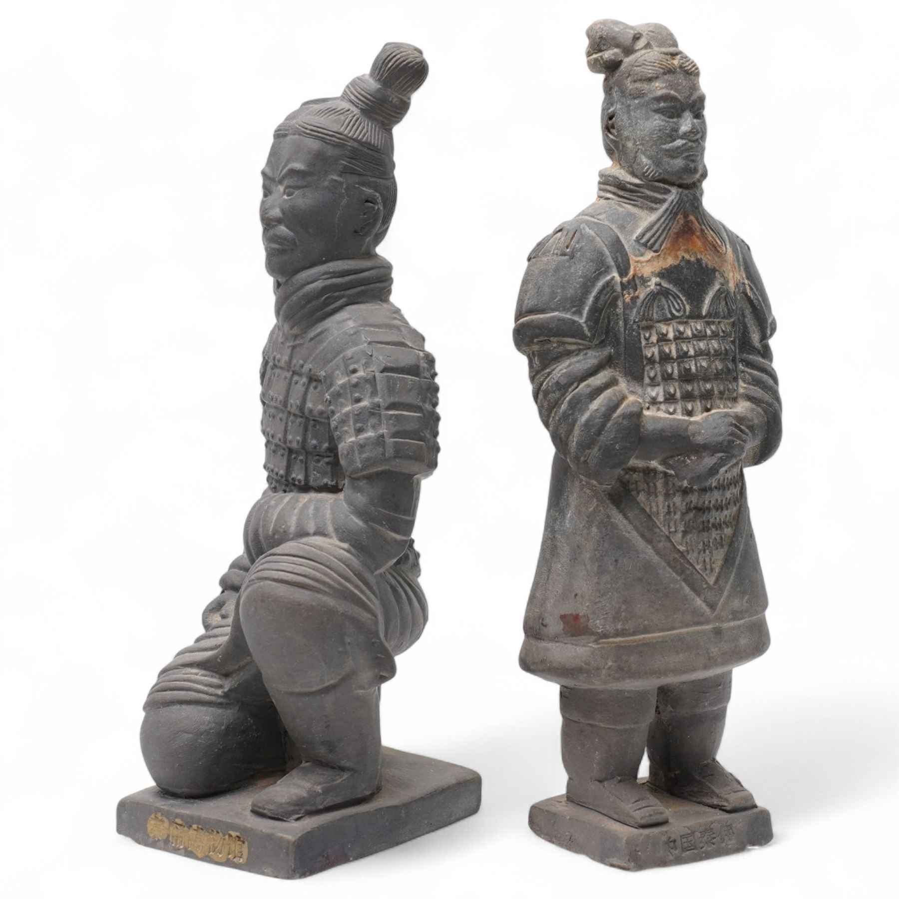 Three Chinese mud man figures, including man with fish, together with two terracotta warriors, H16cm
