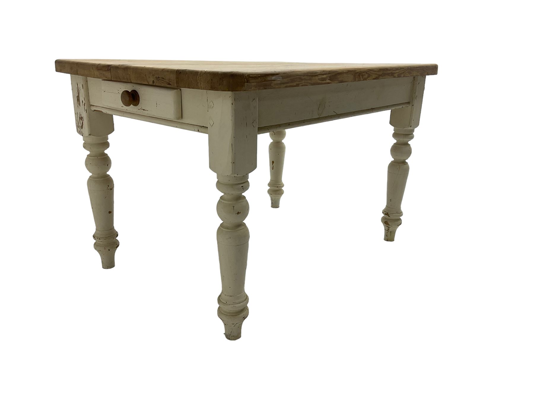 Traditional pine kitchen table with white painted base, rectangular top over single drawer, raised on turned supports