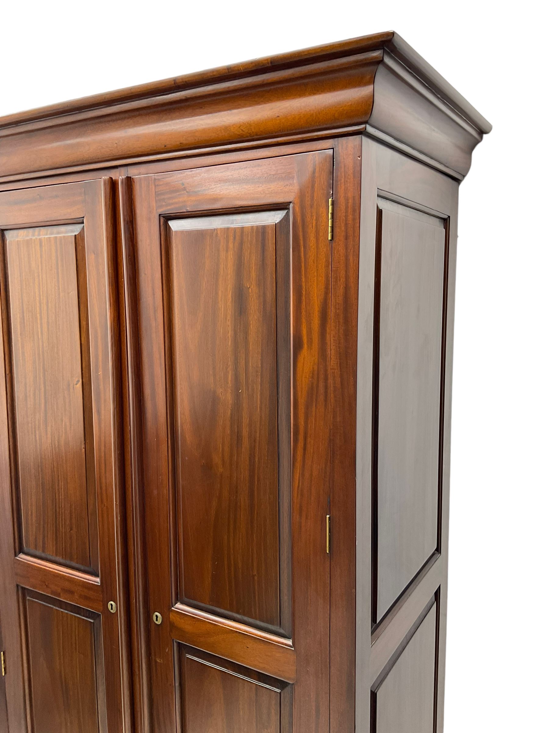 Barker & Stonehouse - 'Grosvenor' mahogany double wardrobe, projecting cornice over two panelled doors and panelled sides, on bracket feet
