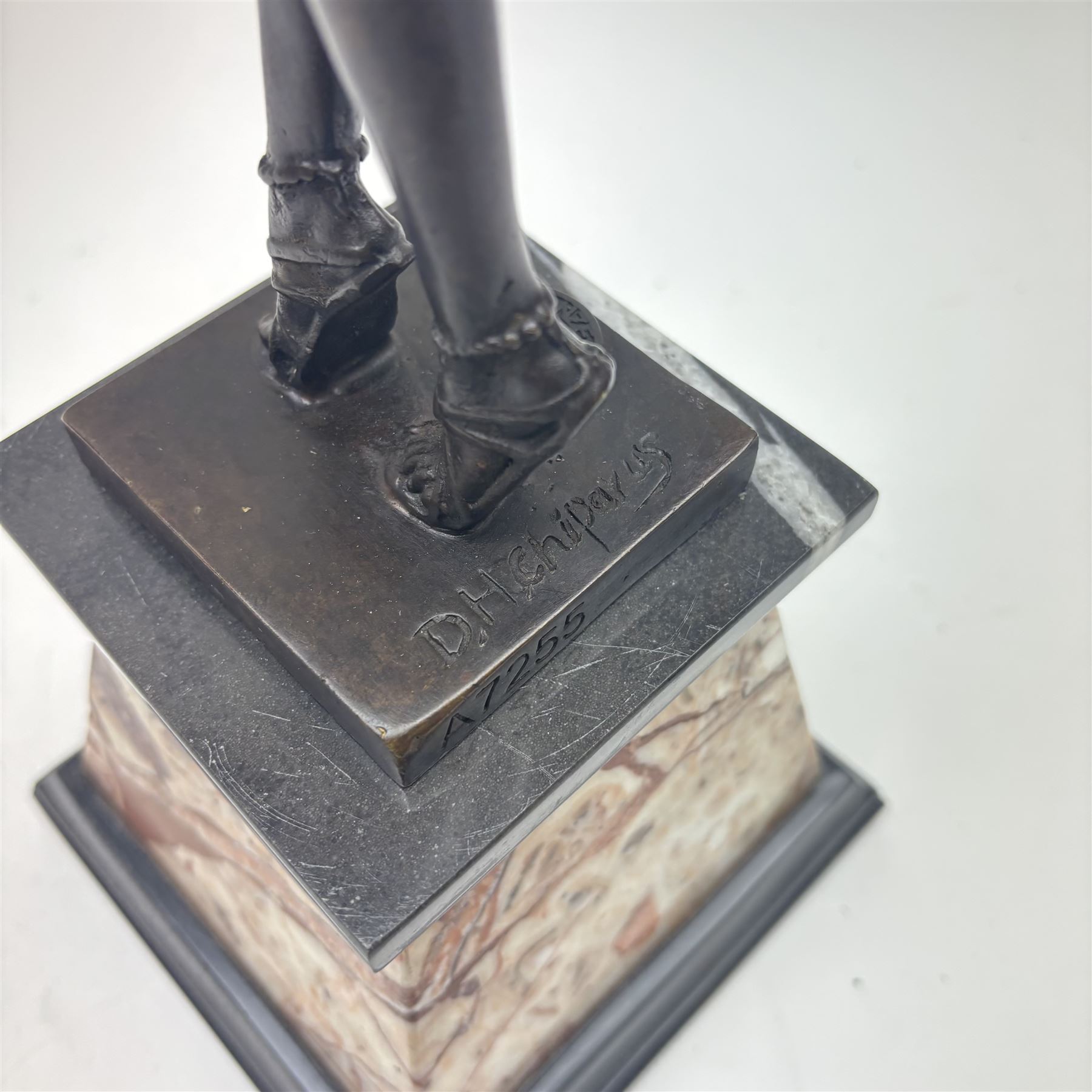 After Demétre Haralamb Chiparus (Romanian 1886-1947): Art Deco style bronze figure modelled as a dancer with raised arms, signed to the stepped bronze base and also bearing foundry stamp, upon a tapering marble plinth, overall H55cm

