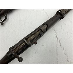 WW1 Lee Enfield SMLE .303 bolt action rifle with 63.5cm barrel and magazine; No.20934; L112cm overall; home deactivated by welding down bolt and end of barrel so requires re-deactivation to modern standards; and 19th century 12-bore double barrel hammer shotgun with 65cm cut-down barrels, non-rebounding hammers and under-lever opening, the lock-plate indistinctly inscribed G.T. Bartrant(?) L75cm overall; home deactivated by welding both barrels closed at breech so requires re-deactivation to modern standards (2) RFD ONLY 