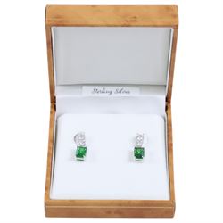 Pair of silver cubic zirconia green stone pendant earrings, boxed