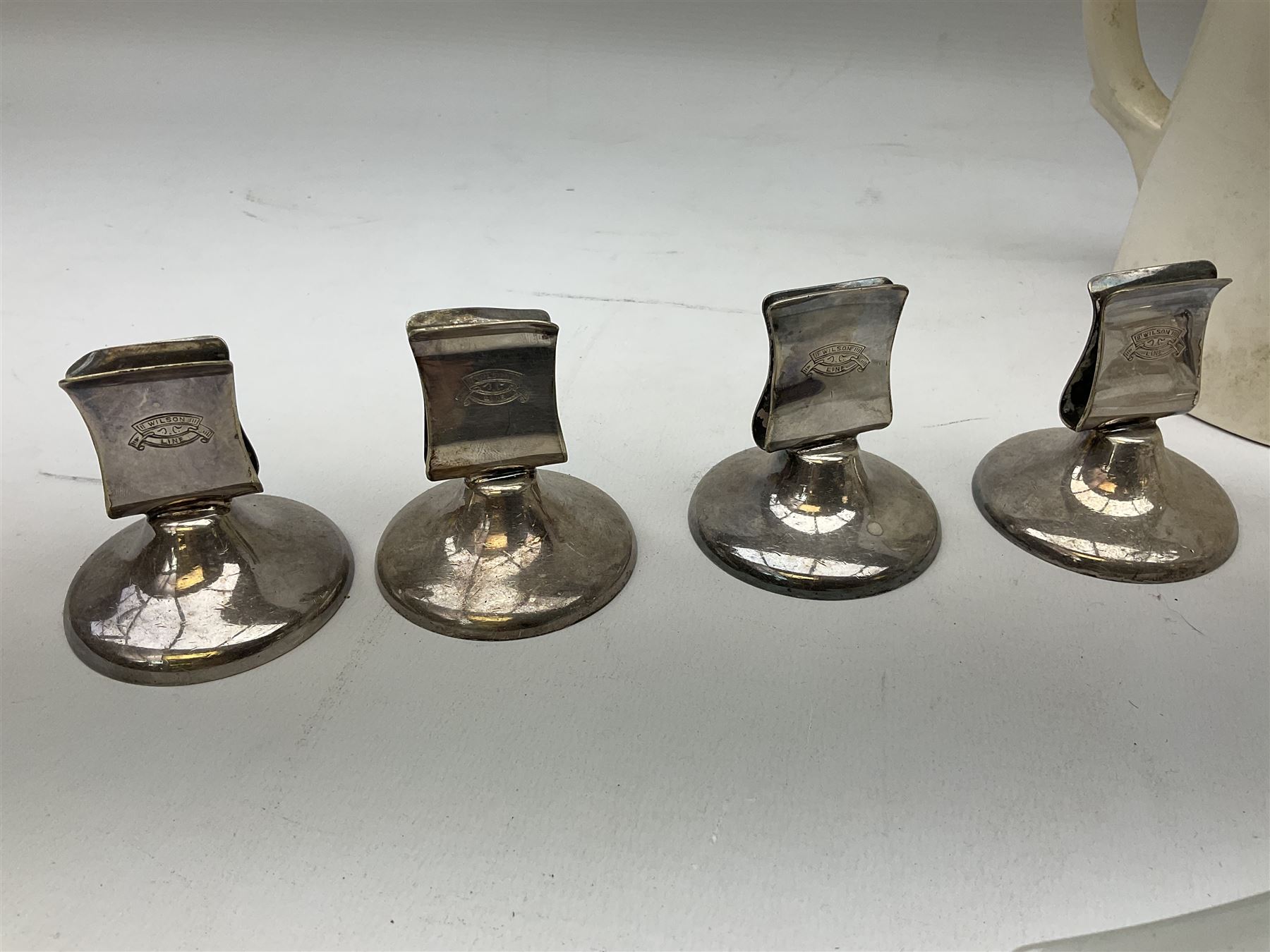 Wilson Line of Hull - five graduated ceramic jugs by Weatherby, Adams and Crown Ducal, largest H22cm, sets of six port and liqueur glasses, four silver plated menu holders and glass ashtray (22)  