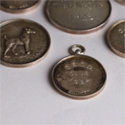 Seven 1920s Old English Sheepdog silver medals, all hallmarked, together with two further silver plated dog related medals