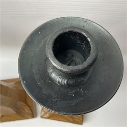 Mouseman - pair of tooled oak candlesticks, wrought iron sconce with drip tray over tapered octagonal column carved with mouse signature, terminating to stylised leaf carved square base, by the workshop of Robert Thompson, Kilburn
