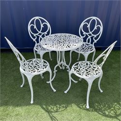 White finish cast metal garden table (D62cm, H70cm), and set four matching garden chairs - THIS LOT IS TO BE COLLECTED BY APPOINTMENT FROM DUGGLEBY STORAGE, GREAT HILL, EASTFIELD, SCARBOROUGH, YO11 3TX