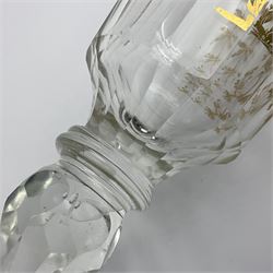 Three 18th century wine glasses comprising a plain stemmed glass with bell shaped bowl and conical folded foot H16cm, another plain stemmed glass with ogee bowl and folded foot and a Continental glass with gilt faceted bowl, decorated with male figure within a landscape, on a clear Silesian seven sided cut stem (3)