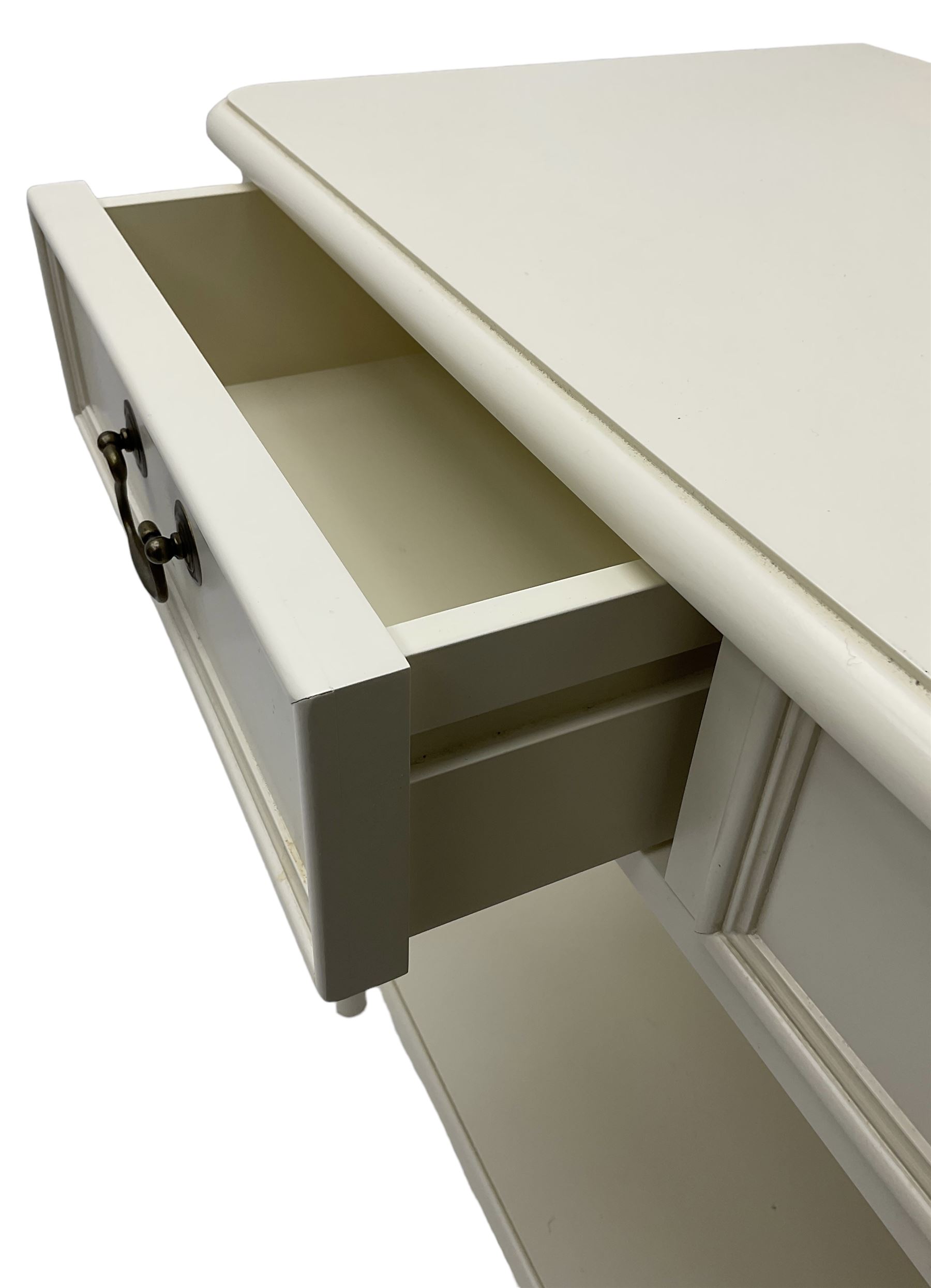 Laura Ashley - 'Clifton' ivory finish three drawer console table, fitted with three frieze drawers with heavily moulded edges, raised on turned supports united by undertier