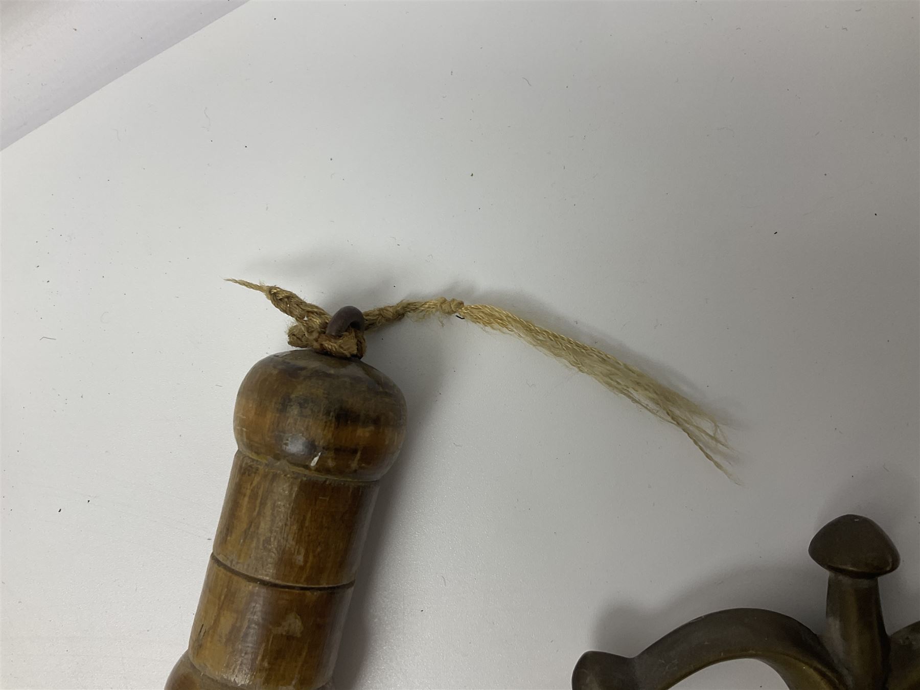 Near pair of short swords each with slightly curving 41cm fullered steel blade and all brass H-shaped hilt L52cm overall; plaited black leather whip; and reproduction pair of brass hilted swords, brass halberd blade and mace (7)