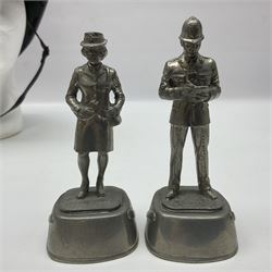 Police - Victorian turned hardwood truncheon with traces of decoration and VR cypher L42cm; Humberside Police helmet with Queens Crown helmet plate; hand lamp inscribed 'The Inspector'; and small pair of pewter figures of police officers (5)