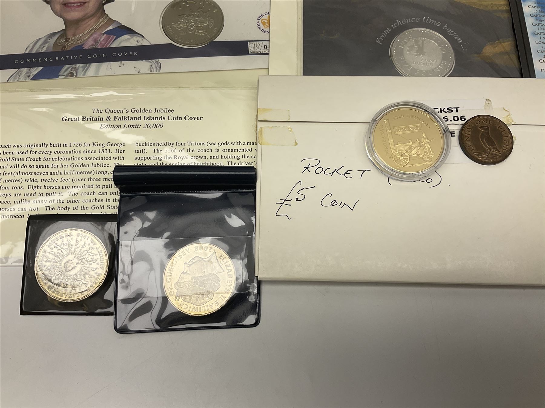 Coins and stamps, including The Royal Mint Great Britain 1970 coin set in plastic holder, 2006 'Brunel' coin cover containing two commemorative two pound coins, Alderney 2006 sterling silver proof five pounds, two 2007 five pound coins in card folders, two limited edition mint first class stamp sheets each comprised of ten first class stamps, various first day covers many with special postmarks housed in 'Royal Mail' boxes etc