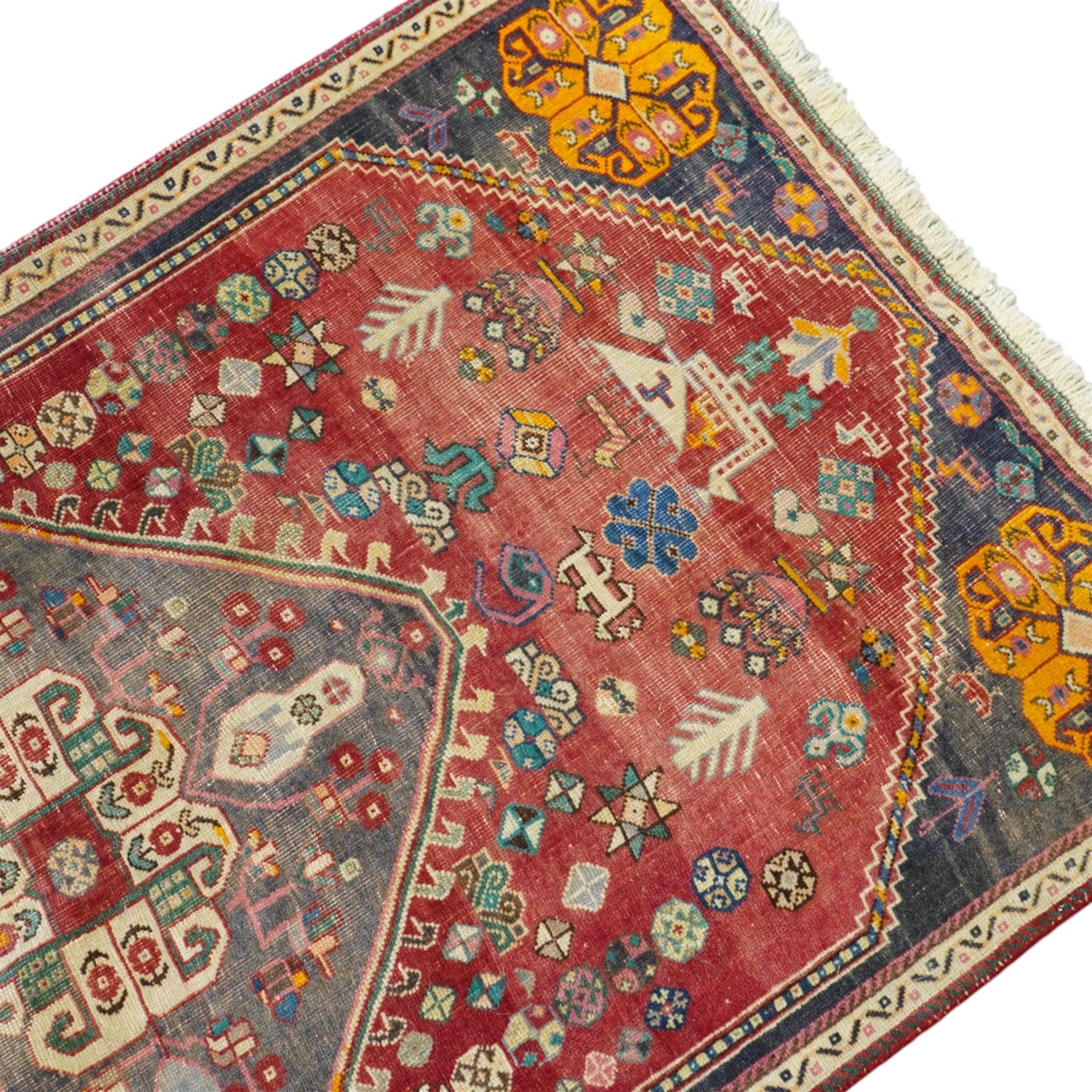 Persian crimson ground rug, decorated with small geometric motifs and animals (158cm x 83cm); together with a Turkish rug (206cm x 119cm)