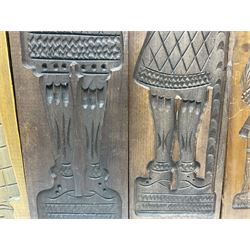 Six 20th century hardwood Dutch folk art Speculaasplank or biscuit moulds, typically carved with figures in traditional dress, largest H101cm