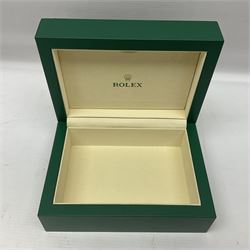 Rolex green leather box, with decorative pleated panel to cover, opening to reveal cream velvet interior, the inside lid stamped Rolex with gilded crown logo, printed mark beneath 'Rolex SA Geneve Swiss 39139.64, together with Rolex note paper in box, box H7.7cm