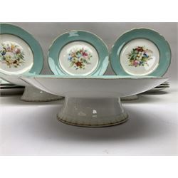 Victorian dessert service, comprising three comports and twelve plates, each decorated with floral sprigs to the centre with a blue and gilt border