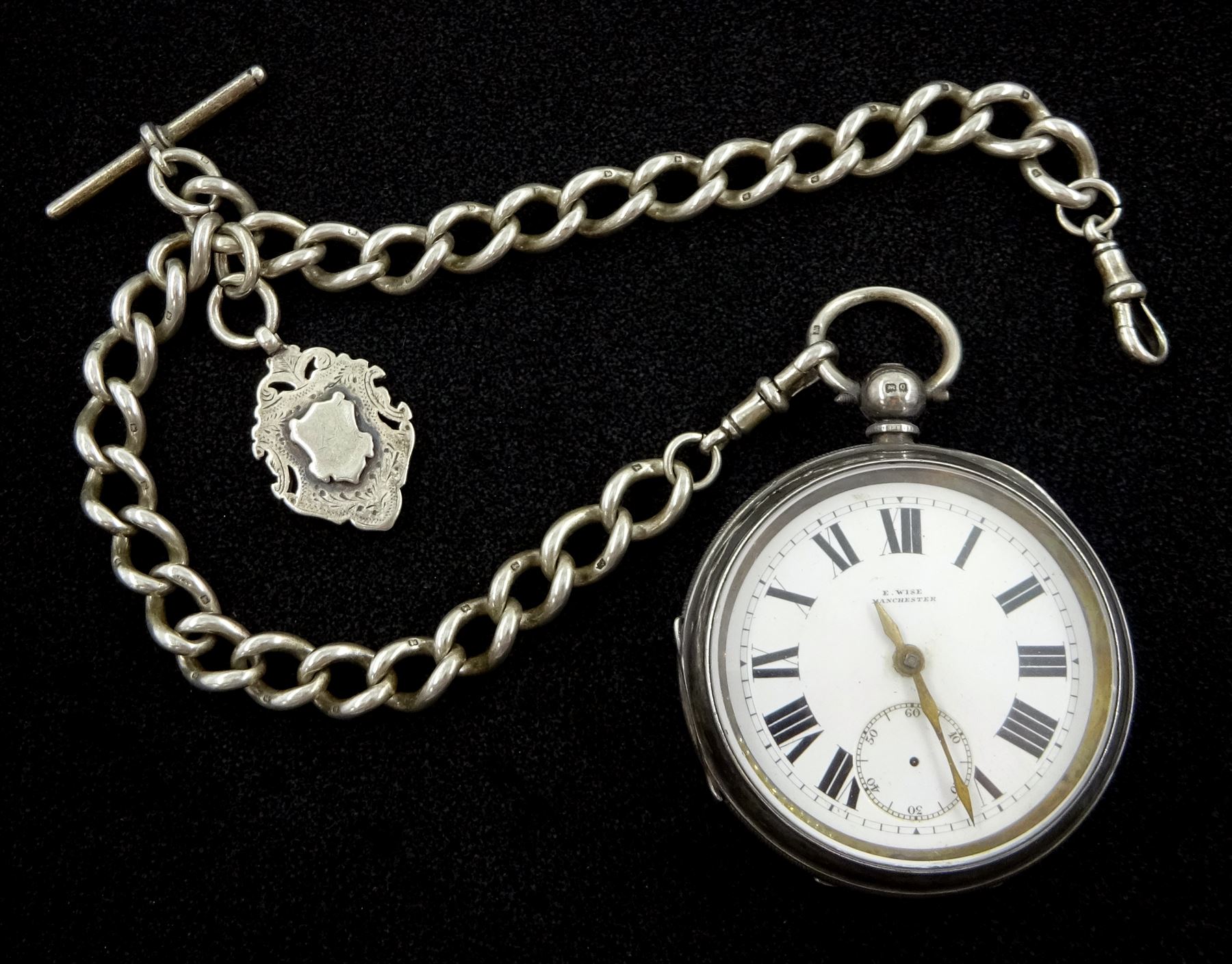 Early 20th century silver fusee lever pocket watch by E.Wise, Manchester, white enamel dial with Roman numerals, case by William Ehrhardt Ltd, Birmingham 1915, on silver Albert chain, each link hallmarked