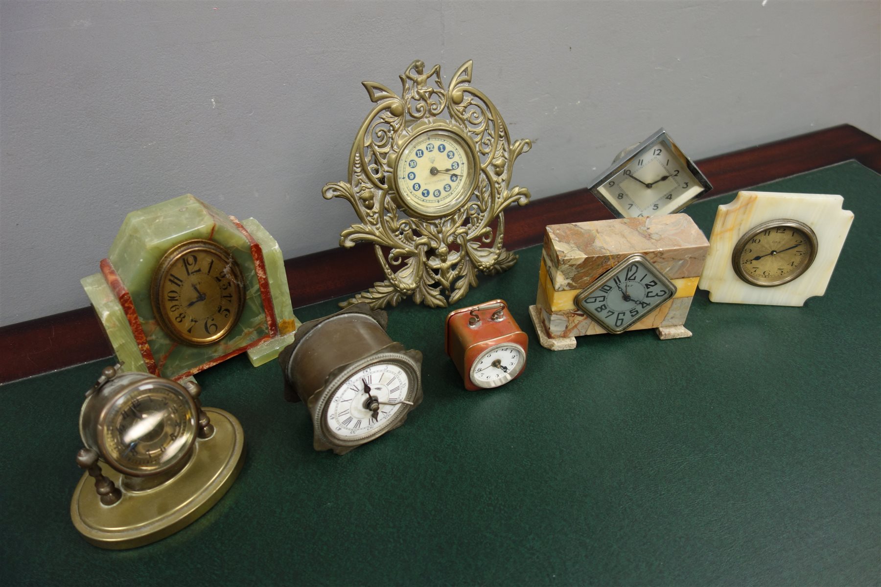 Collection of small clocks including 20th century ornate cast gilt
