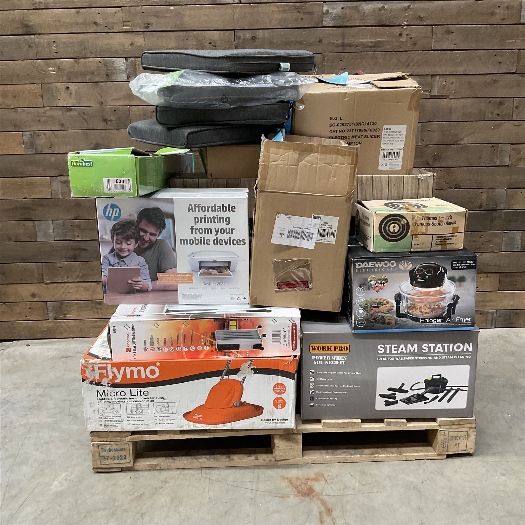 Collection of boxed items including a Flymo Micro Lite lawn mower, HP printer, Daewoo Halogen Air Fryer, an oil filled radiator etc