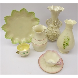  Belleek ceramics including a flower encrusted two handled vase with second period stamp, Colonial vase, clover leaf pot, flower shaped dish & cup and saucer with a similar style vase (7)  