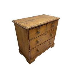 Late 19th century waxed pine chest, rectangular top with moulded edge, fitted with two short over two long graduating drawers with turned wood handles, raised on bracket feet with shaped apron