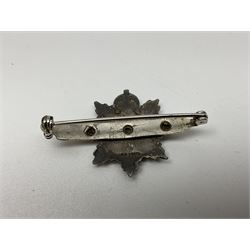 Popski's Private Army sterling silver cap badge; and two silver sweetheart brooches for Highland Light Infantry as a rifle and silver gilt Glengarry badge and Army Service Corps with blue enamel; and another silver badge (4)